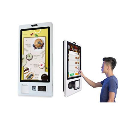 プリンターおよび走査器が付いているレストランの切符の自動販売機の壁に取り付けられたキオスク